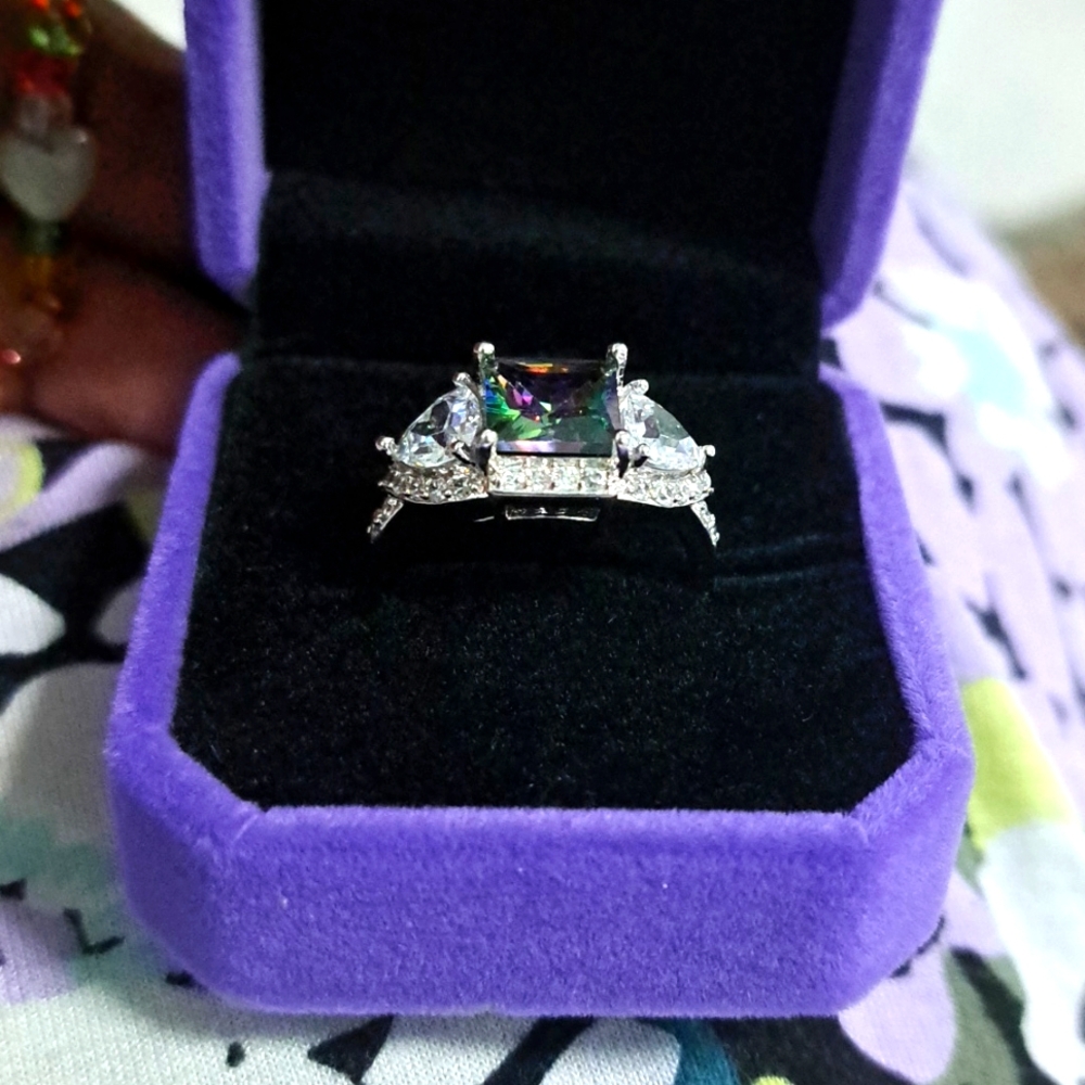 3 For 45$ Al rainbow topaz with 3 big stones.There are several zirconiums